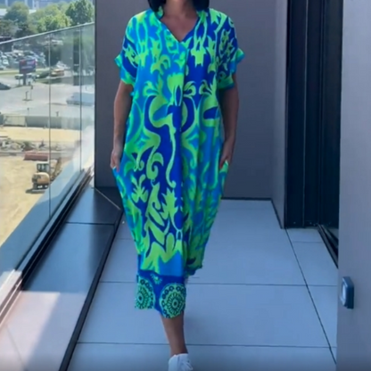 👗Women's Casual Elegant Printed V-Neck Dress