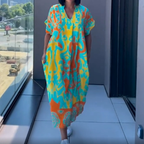 👗Women's Casual Elegant Printed V-Neck Dress
