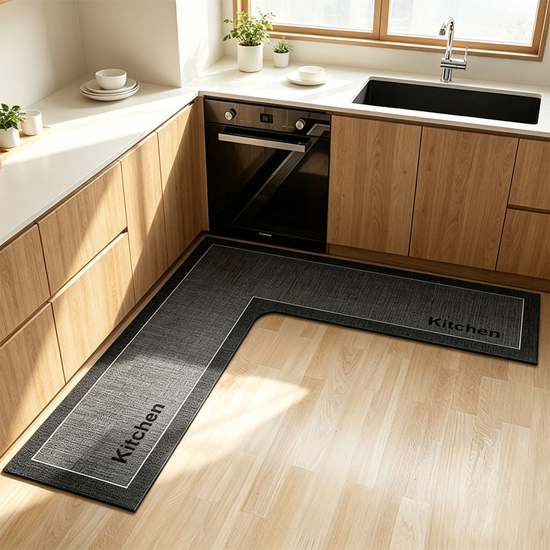 💧 Stop slipping on wet kitchen floors — this L-shaped mat absorbs water and oil fast, stays put, and cushions your feet while you cook. 🏠