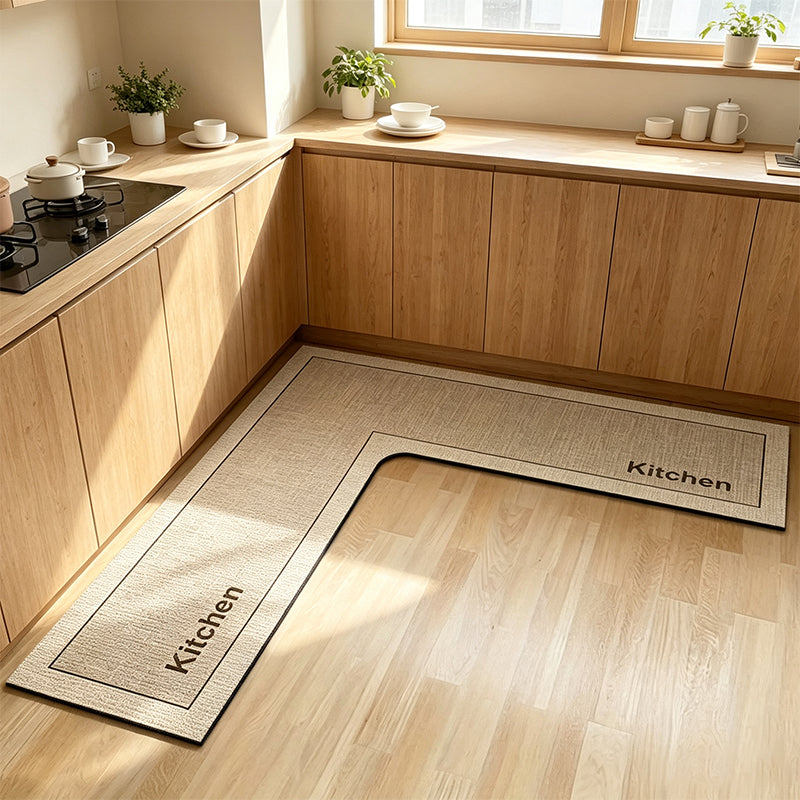 💧 Stop slipping on wet kitchen floors — this L-shaped mat absorbs water and oil fast, stays put, and cushions your feet while you cook. 🏠